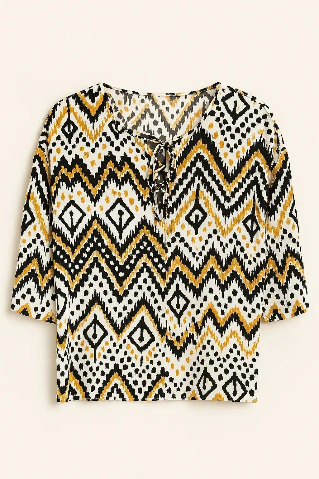 Blusa con laccetti in fantasia etno